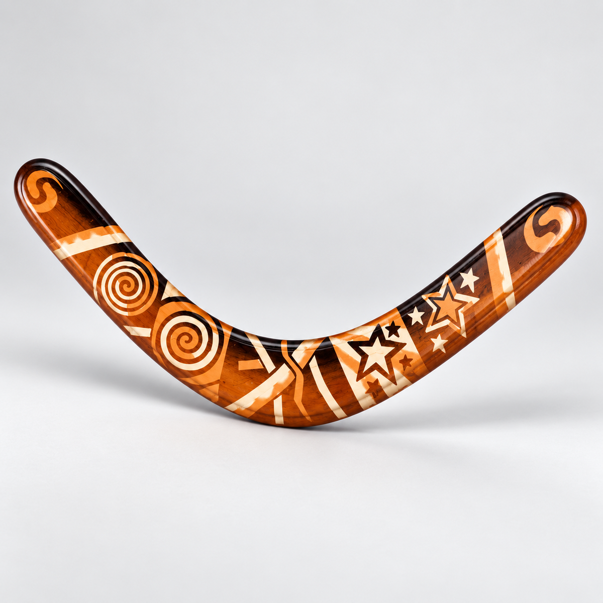Boomzi Adult Wooden Returning Boomerang with Tribal Spiral & Star Artwork