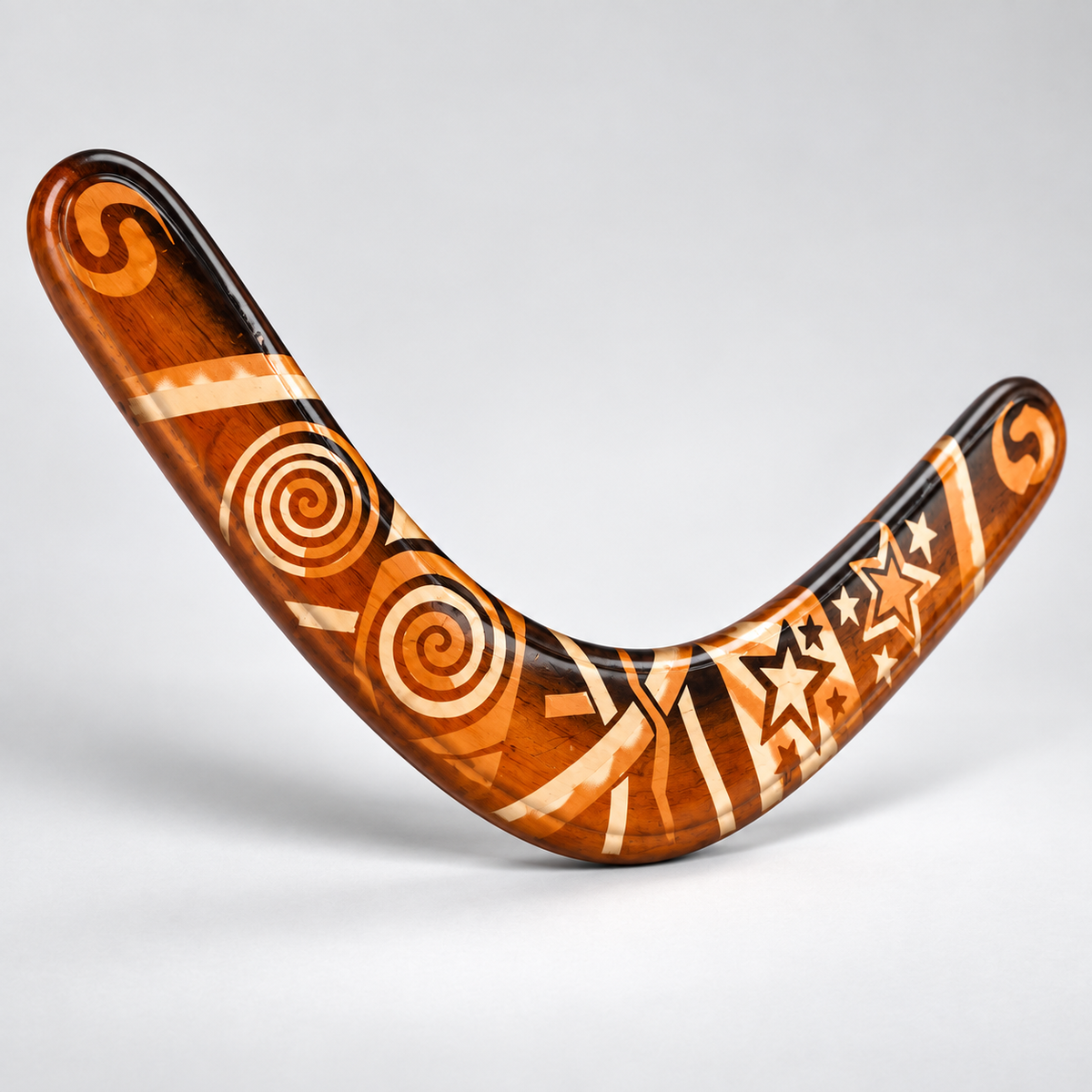 Boomzi Adult Wooden Returning Boomerang with Tribal Spiral & Star Artwork